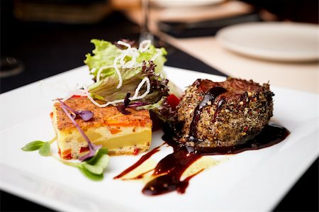 Beef fillet with potato gratin and fresh salad Stock Photo - Budget Royalty-Free & Subscription, Code: 400-06518391