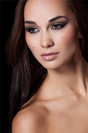Portrait of a model with glamourous makeup on black background Stock Photo - Budget Royalty-Free & Subscription, Code: 400-06518415