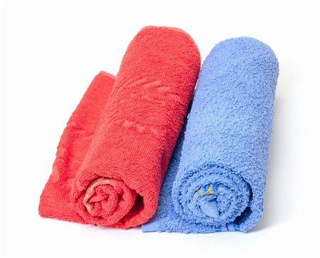 fabric roll - Two thick absorbent rolled red and blue bath towels on white background conceptual of health, hygiene and a spa treatment Stock Photo - Budget Royalty-Free & Subscription, Code: 400-06519617