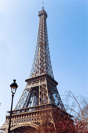 simsearch:400-06925608,k - The Eiffel Tower (nickname La dame de fer, the iron lady),The tower has become the most prominent symbol of both Paris and France Stock Photo - Budget Royalty-Free & Subscription, Code: 400-06513418