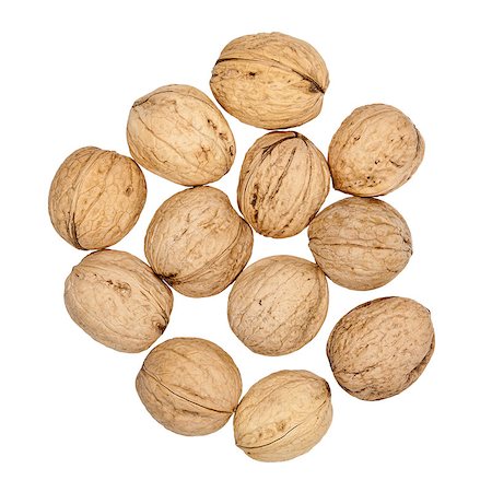 simsearch:400-06520688,k - Heap of walnuts isolated on white background Stock Photo - Budget Royalty-Free & Subscription, Code: 400-06524858