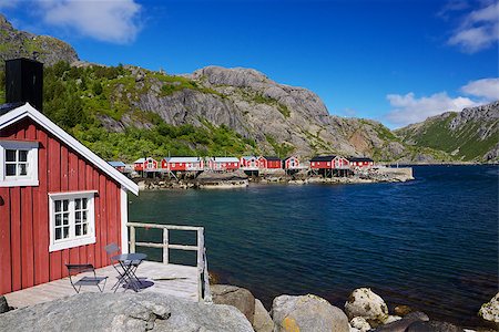 simsearch:400-07313859,k - Typical red rorbu fishing huts in village of Nusfjord, unesco heritage on Lofoten islands, Norway Foto de stock - Super Valor sin royalties y Suscripción, Código: 400-06525144