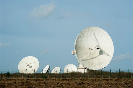 stockarch (artist) - View of the large parabolic satellite antennas at the Goonhilly Earth Station, Lizard Peninsula, Cornwall which houses the first ever parabolic dish called Arthur Foto de stock - Royalty-Free Super Valor e Assinatura, Número: 400-06525169