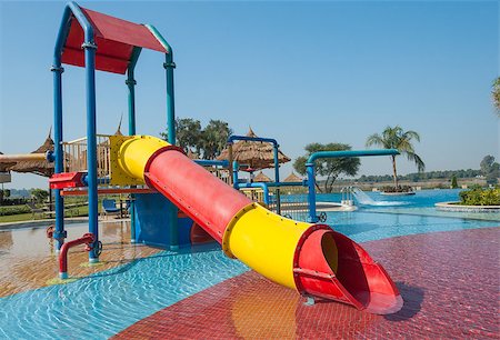 play area - Climbing frame and slide in children's play area of a shallow swimming pool Stock Photo - Budget Royalty-Free & Subscription, Code: 400-06525255