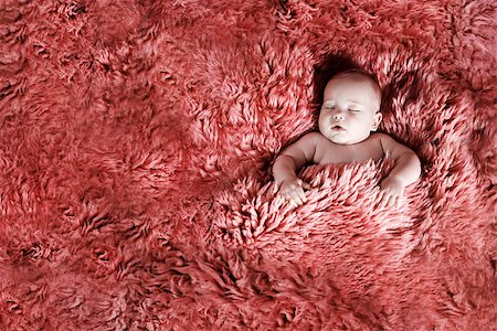 simsearch:400-07211187,k - Image of a child sleeping on fur Photographie de stock - Aubaine LD & Abonnement, Code: 400-06526061
