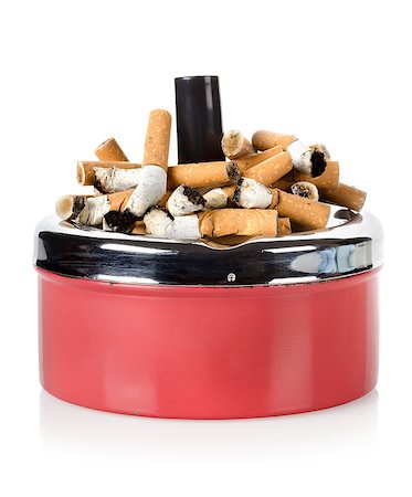 simsearch:640-03256518,k - Cigarettes and old metal ashtray isolated on white background Foto de stock - Super Valor sin royalties y Suscripción, Código: 400-06526122