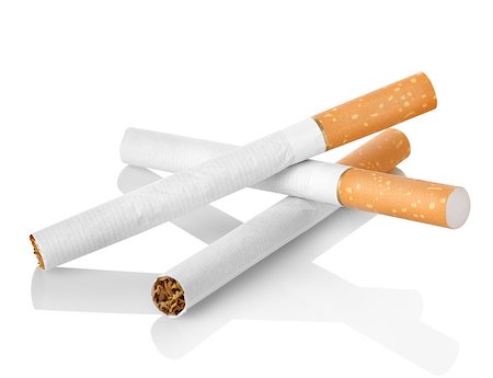 simsearch:400-04274877,k - Cigarettes with orange filter isolated on a white background. Clipping path Photographie de stock - Aubaine LD & Abonnement, Code: 400-06526123