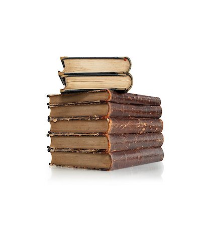 simsearch:400-06772771,k - Stack of old books on white background. Clipping path is included Photographie de stock - Aubaine LD & Abonnement, Code: 400-06526501