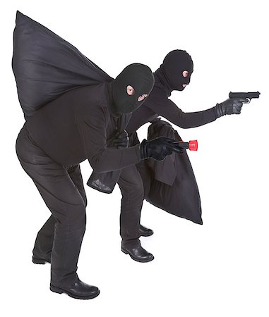 pair of two robbers on white background Stock Photo - Budget Royalty-Free & Subscription, Code: 400-06526616