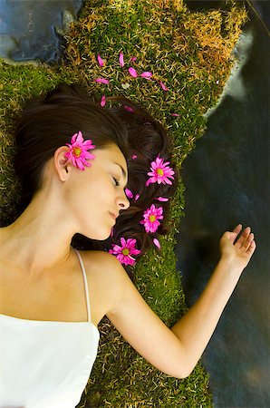 Young women resting near stream with flowers in hair Stock Photo - Budget Royalty-Free & Subscription, Code: 400-06527045
