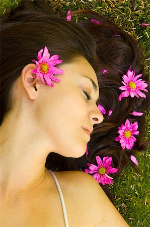 Young women resting near stream with flowers in hair Stock Photo - Budget Royalty-Free & Subscription, Code: 400-06527046
