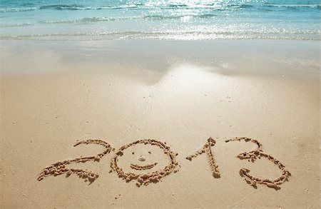 digits 2013 on the sand seashore - concept of new year Stock Photo - Budget Royalty-Free & Subscription, Code: 400-06527313
