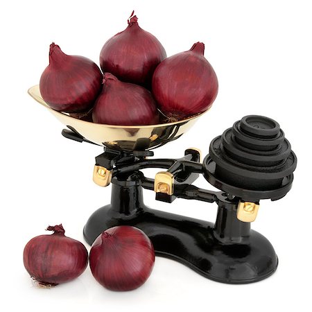 Red onions and retro kitchen scales with cast iron imperial weights over white background. Stock Photo - Budget Royalty-Free & Subscription, Code: 400-06527798
