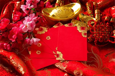 Chinese new year festival decorations , the chinese character on the gold ingots means fortune and luck Stock Photo - Budget Royalty-Free & Subscription, Code: 400-06528719