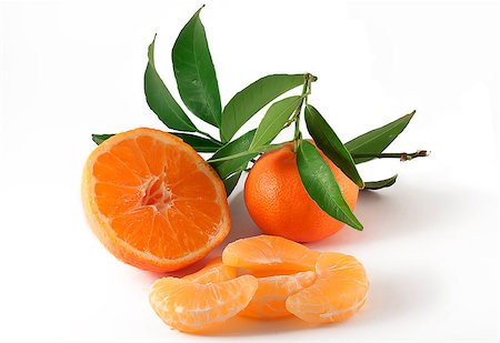 simsearch:400-05046087,k - peeled mandarin and slices on white Stockbilder - Microstock & Abonnement, Bildnummer: 400-06528785