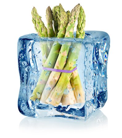 frozen vegetables - Ice cube and asparagus isolated on a white background Stock Photo - Budget Royalty-Free & Subscription, Code: 400-06529989