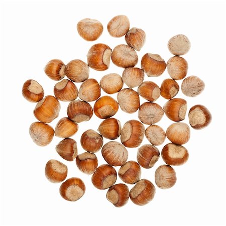simsearch:400-06520688,k - The heap of hazelnuts isolated on white background Stock Photo - Budget Royalty-Free & Subscription, Code: 400-06520680