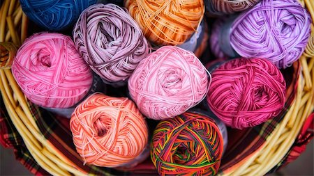 simsearch:400-05296034,k - balls of knitted wool in basket, closeup Stock Photo - Budget Royalty-Free & Subscription, Code: 400-06520774