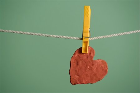 heart shaped object dryed on the wire Stock Photo - Budget Royalty-Free & Subscription, Code: 400-06521029