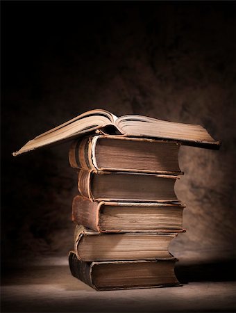 Old books stacked, with one open book on top. Stock Photo - Budget Royalty-Free & Subscription, Code: 400-06521111