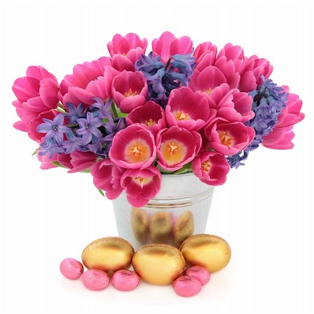 Tulip and hyacinth flower arrangement in a metal vase with chocolate easter egg group over white background. Stock Photo - Budget Royalty-Free & Subscription, Code: 400-06521219