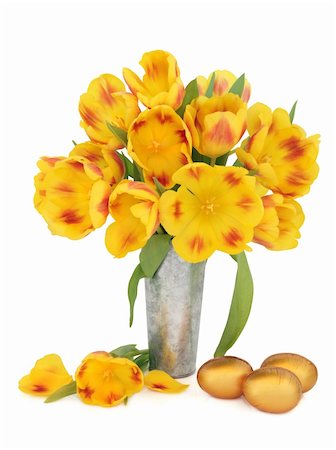 simsearch:400-06356460,k - Yellow and red tulip flower arrangement in an aluminium vase with gold chocolate easter eggs over white background. Foto de stock - Super Valor sin royalties y Suscripción, Código: 400-06521211