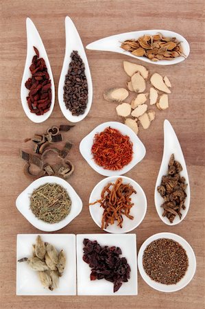 Chinese herbal medicine selection over papyrus background. Stock Photo - Budget Royalty-Free & Subscription, Code: 400-06521309