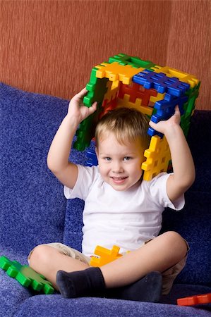 a small boy playing Stock Photo - Budget Royalty-Free & Subscription, Code: 400-06521484