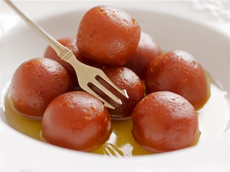 close up of indian dessert gulab jamun Foto de stock - Super Valor sin royalties y Suscripción, Código: 400-06521643