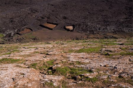Empty animal farm underneath volcano in Volcanic park Timanfaya on island Lanzarote, Canary Islands Photographie de stock - Aubaine LD & Abonnement, Code: 400-06522120