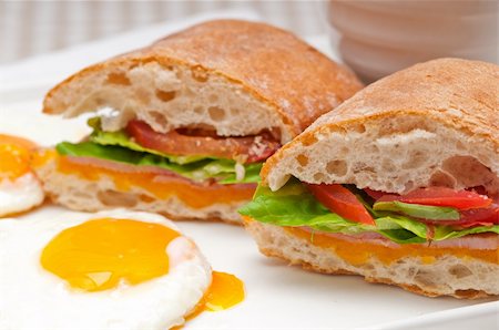 simsearch:400-06641159,k - fresh ciabatta panini sandwich with eggs tomato lettuce Foto de stock - Super Valor sin royalties y Suscripción, Código: 400-06522395