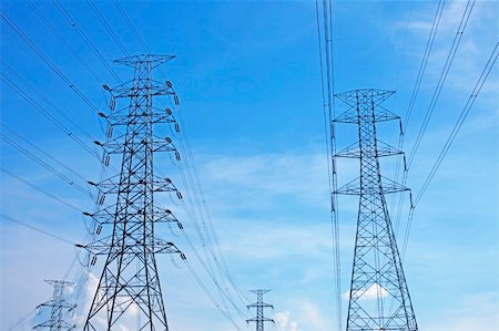 electric grid - high voltage power pylons on sky blue Stock Photo - Budget Royalty-Free & Subscription, Code: 400-06522499