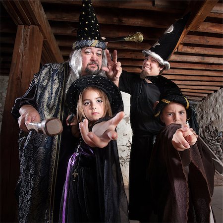 Cute family of people dressed in Halloween costumes Stock Photo - Budget Royalty-Free & Subscription, Code: 400-06522823