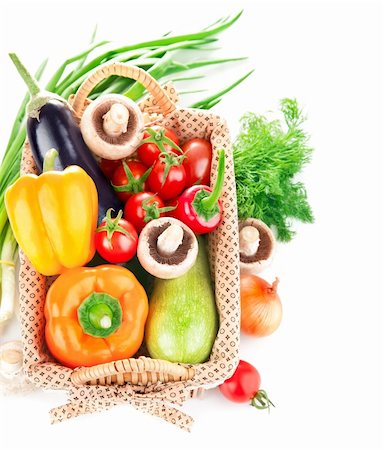 simsearch:400-05939266,k - fresh vegetables with leaves in the basket isolated on white background Photographie de stock - Aubaine LD & Abonnement, Code: 400-06523081