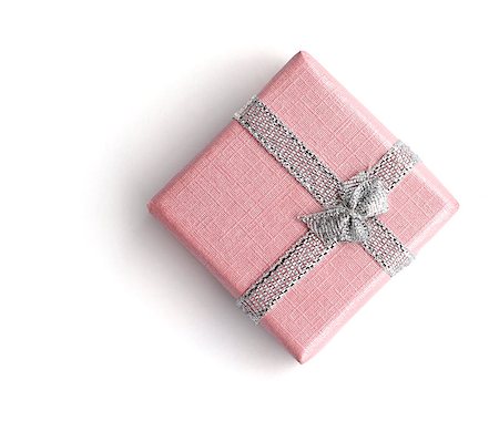 Tiny pink gift box isolated on white paper with soft shadow Stock Photo - Budget Royalty-Free & Subscription, Code: 400-06523435