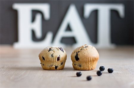 photos of blueberries for kitchen - Blueberry muffins with the word EAT in the background Stock Photo - Budget Royalty-Free & Subscription, Code: 400-06523479
