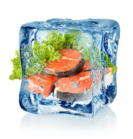 frozen vegetables - Ice cube and salmon isolated on a white background Foto de stock - Super Valor sin royalties y Suscripción, Código: 400-06530025