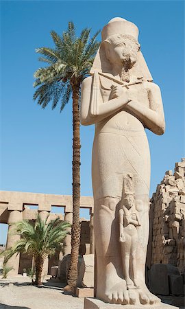 egyptian hieroglyphs color - Large famous statue of Ramses in the ancient temple at Karnak Luxor Stock Photo - Budget Royalty-Free & Subscription, Code: 400-06530193