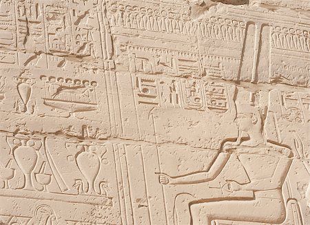 simsearch:400-04782815,k - Ancient Egyptian hieroglyphic carvings on a temple wall at Karnak in Luxor Foto de stock - Super Valor sin royalties y Suscripción, Código: 400-06530205