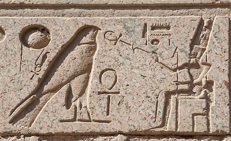 simsearch:400-04782815,k - Ancient Egyptian hieroglyphic carvings on a temple wall at Karnak in Luxor Foto de stock - Super Valor sin royalties y Suscripción, Código: 400-06530207