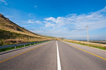simsearch:400-06415579,k - Power Line along the Asphalt Road in Galilee, Israel Stock Photo - Budget Royalty-Free & Subscription, Code: 400-06530918