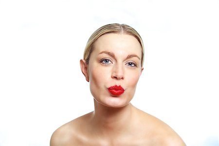 simsearch:400-07619824,k - A young female blonde model pouting for the camera. Stock Photo - Budget Royalty-Free & Subscription, Code: 400-06555159