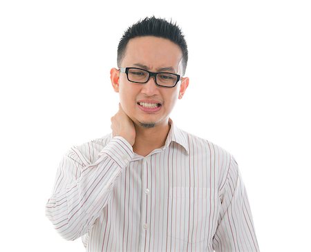 asian male having a bad neck pain Stock Photo - Budget Royalty-Free & Subscription, Code: 400-06555218