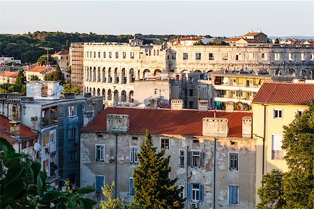 Aerial View on Ancient Roman Amphitheater and City of Pula, Croatia Stock Photo - Budget Royalty-Free & Subscription, Code: 400-06555444