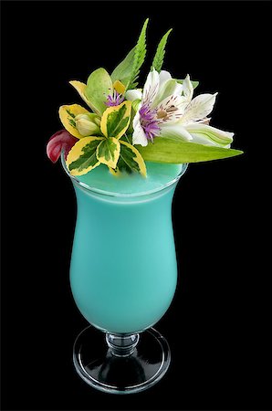 daiquiri - Blooming alcohol blue drink with flowers and cherry, isolated black background Foto de stock - Super Valor sin royalties y Suscripción, Código: 400-06555769