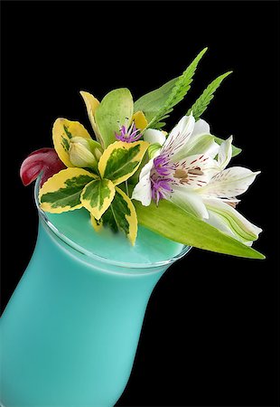 daiquiri glass - Bluenat Hawayan alcohol blue drink with flowers and cherry, isolated black background Stock Photo - Budget Royalty-Free & Subscription, Code: 400-06555770