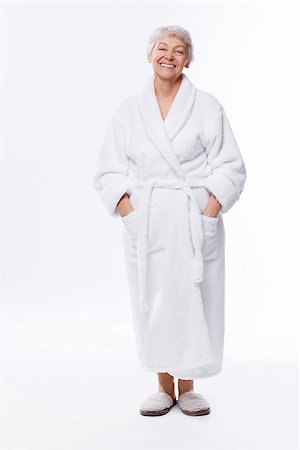 simsearch:400-06482471,k - Elderly woman in a bathrobe on a white background Stock Photo - Budget Royalty-Free & Subscription, Code: 400-06556017