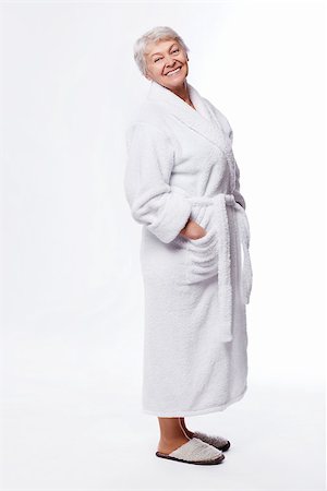 simsearch:400-06482471,k - Elderly woman in a bathrobe on a white background Stock Photo - Budget Royalty-Free & Subscription, Code: 400-06556018