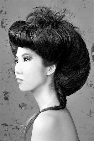 Tall Asian Woman With High Styled Hair Photographie de stock - Aubaine LD & Abonnement, Code: 400-06556158