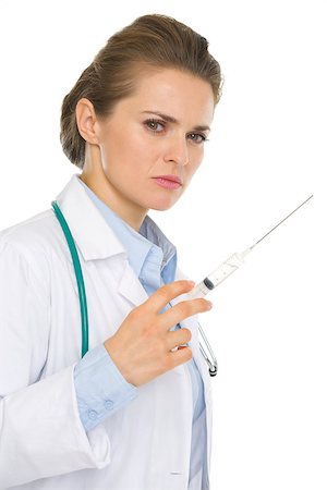 Serious medical doctor woman with syringe Stock Photo - Budget Royalty-Free & Subscription, Code: 400-06556210